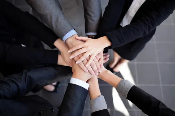 People collaborating around a desk